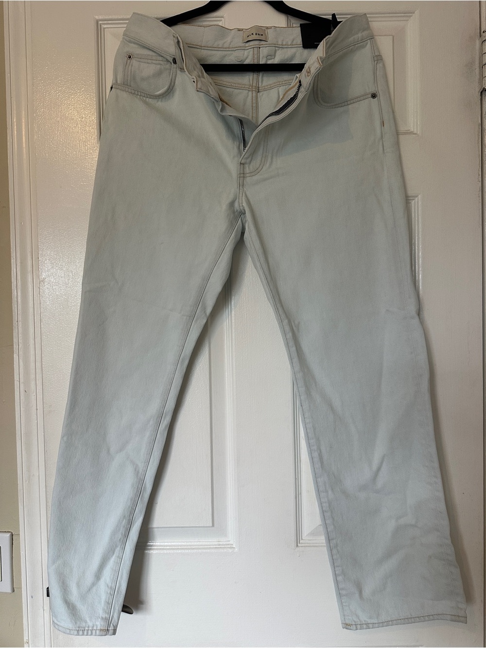 BLK DNM women’s Slim Straight Jeans in Pale Blue